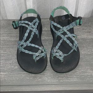 Blue and green Chacos